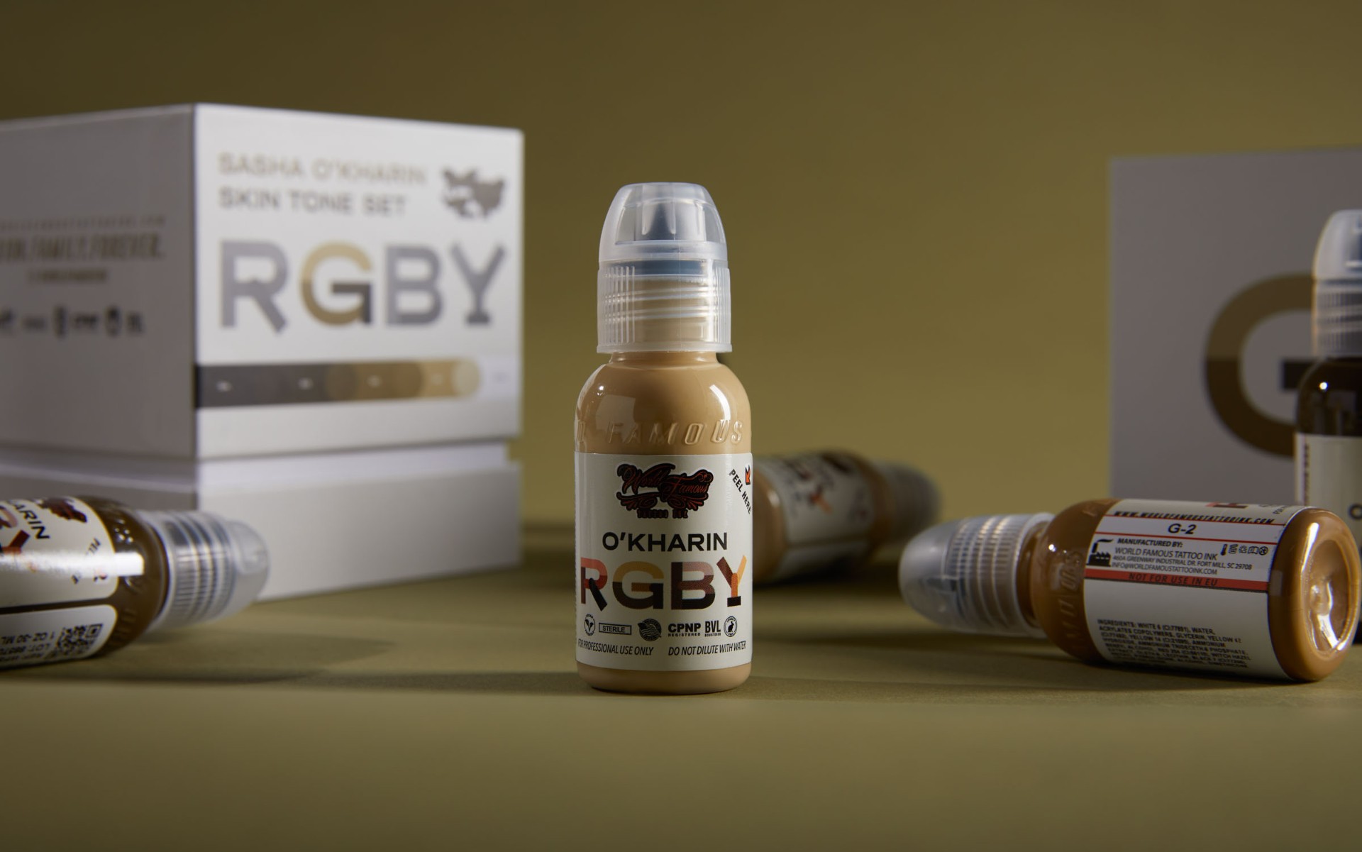 RGBY — G-tone bottle on olive backdrop